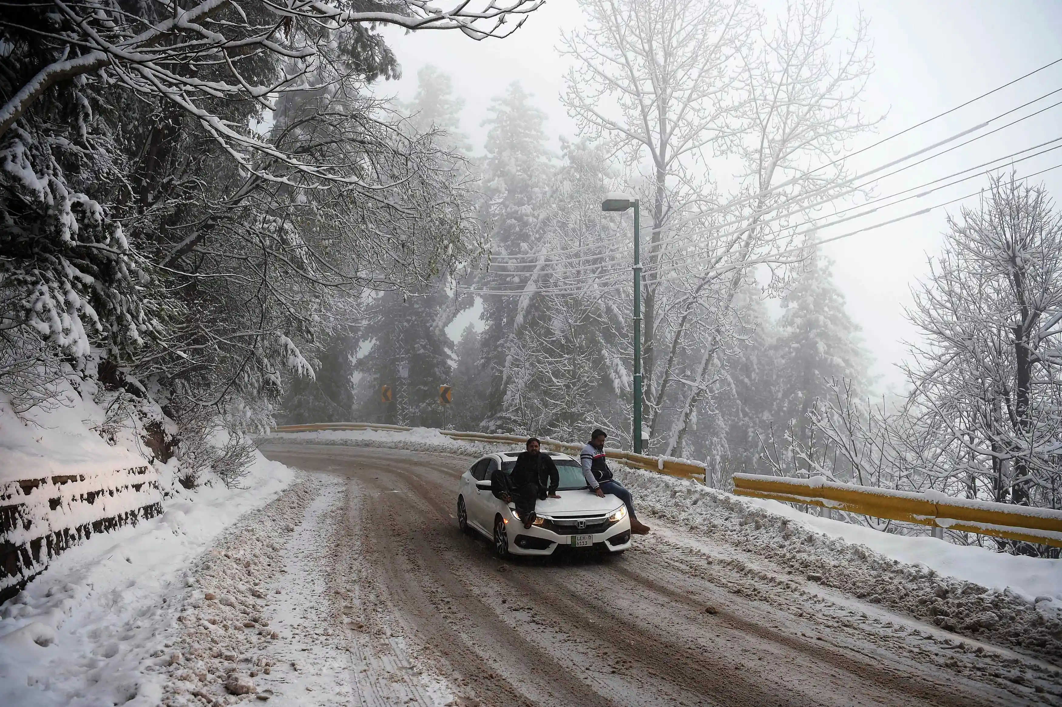 Snow covered roads during snow in Murree
